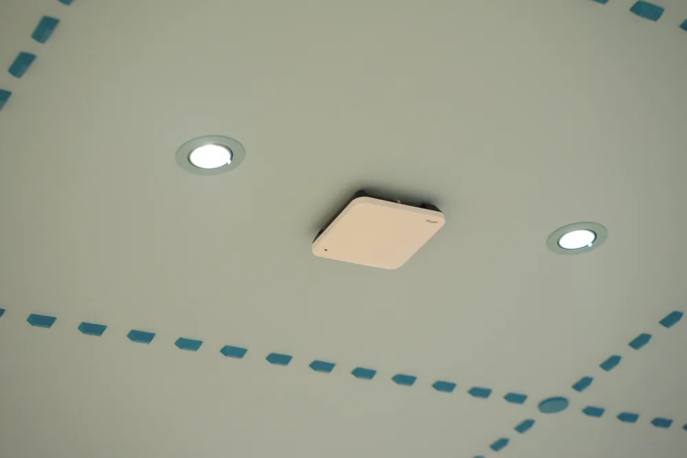 Access point positions marked out on the store ceiling
